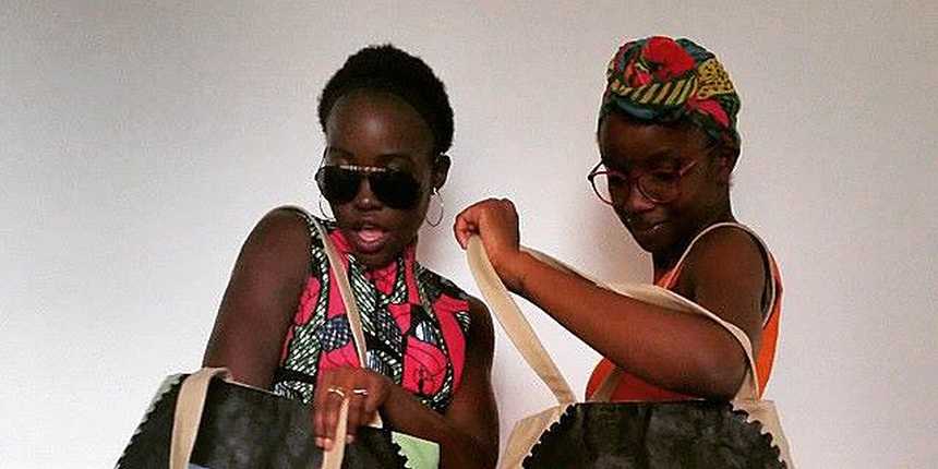  Lupita Nyong'o Sure Does Love Her Colorful Tote Bag by Kenyan Artist Michael Soi